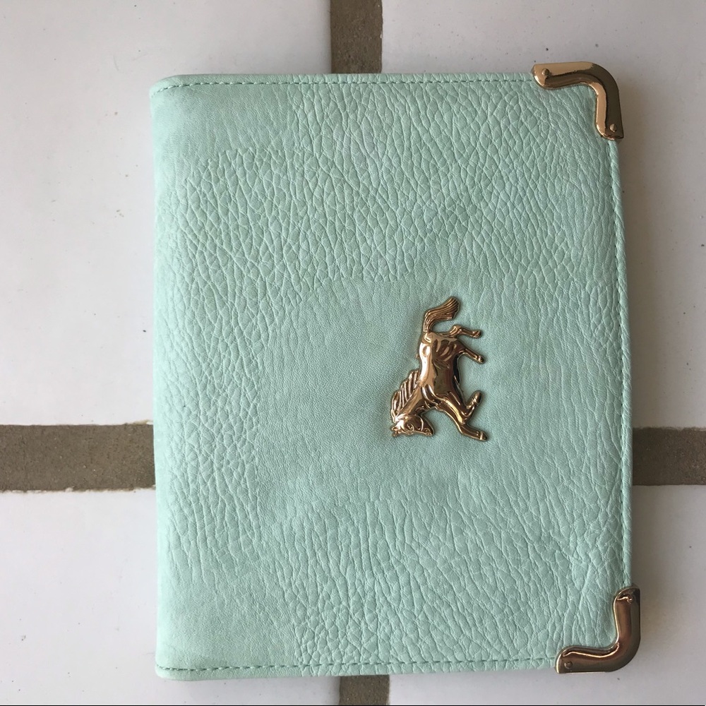 Clutch with horse detail
